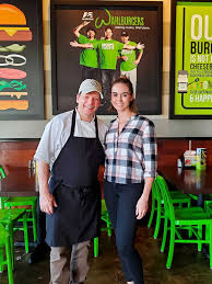 Mark wahlberg demands london restaurant rename burger named after him; Paul Wahlberg Serves Up Burgers And Sides At Wahlburgers Tasty Chomps A Local S Culinary Guide