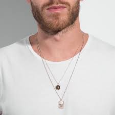 Necklaces for men are worn at different lengths depending on not just the necklace style but also the impression or the statement you wish to make. Guide To Jewelry For Men 2021 How To Wear Rings Bracelets Necklaces