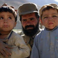 The crowd of Afghan women and children await the access to donations during  a Humanitarian Civic Aid at the Egyptian Hospital. (U.S. Army photo by SPC.  Leslie Angulo) (Released)