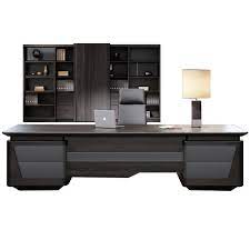 A large executive desk finished in black lacquer with brass accents and grey leather writing surface. High Quality Light Luxury Solid Wood Manager Office Table Ceo L Shape Black Office Executive Desk Buy Modern Office Desk Black Executive Wooden Office Desk Durable Modern Executive Table Office Desk Supply Product
