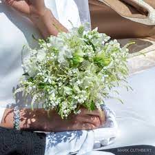 Meghan markle followed tradition and carried a meaningful bouquet at her royal wedding. Meghan Markle S Cartier Bracelet And Bouquet Winter Wedding Bouquet Flower Bouquet Wedding Wedding Ceremony Flowers