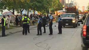 Three police officers suffered minor injuries, and one man was charged with assaulting an officer. Al Umpdb9flh5m