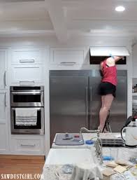 As long as the hole has been drilled properly, the soft close hinge should drop into place with a little coaxing. Lift Up Cabinet Doors Sawdust Girl