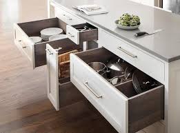 Kitchen cabinets with drawers for pots and lid dividers for binders. Pot And Pan Lid Organizers Design Ideas
