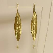 Polished oval hoop earrings in 14k gold. Italian 18k Gold Jewelry Italian Designer Jewelry
