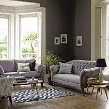Decorate Your Living Room With Matching Grey Sofas And Liven Up The Interior With A Patterned Rug Victorian Living Room Grey Sofa Living Room Living Room Color