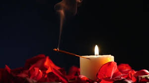 Incense Sticks And Candles Are Burning And Smoke On Dark Background Smoke From Incense And Candle Light Stock Video C Andrew282 188668450