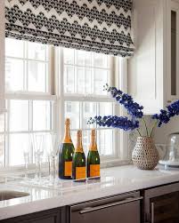 Black And White Roman Shades Beautiful Kitchen Boasts Sash Windows Dressed In Black And White Patterned Roman Shades Over An Kitchen Window Design Patterned Tile Backsplash Kitchen Shades