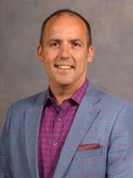 Dr. Christopher Simons