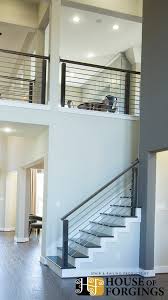 Check out these 50 super cool modern staircase ideas from cutting edge architecturally designed homes including celebrity homes and more. Horizontal Railing Affordable Modern Staircases