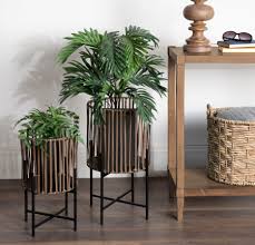 Indoor and outdoor rattan plant display rack, beige 9.84inch, 13.78inch (medium) 2.7 out of 5 stars. Allmodern Joren Floor 2 Piece Pot Planter Set With Pvc Wicker And Metal Stands Reviews Wayfair Ca