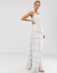20 Rehearsal Dinner Dresses Jumpsuits For Every Type Of Bride Sparkling Ruffled Wedding Dre Rehearsal Dinner Dresses Tiered Maxi Dress Ruffle Wedding Dress