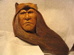 A cherub carved in zebra wood