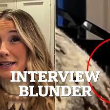 To avoid the camera during a live appearance, the husband of a Welsh  journalist is caught crawling