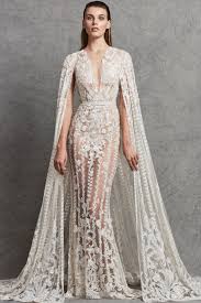 Illusion Lace Sheath Wedding Dress With A Natural Waist Applique Detailing And Detachable Cape Wedding Dress Wedding Dresses Zuhair Murad Zuhair Murad Bridal