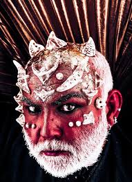 Cara Diabólica. Homem Com Espinhos Ou Verrugas. Conceito De Artes Escuras.  Diabo Com Barba Branca Vestida De Monstro. Mal No Preto Foto de Stock