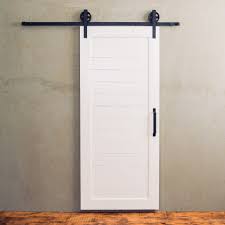 Black And White Barn Door There S Something Special About A Simple White Barn Door Accompanied By Black Barn Door Hardware In A Wooden Barn Doors Barn Doors Sliding Wood Doors Interior