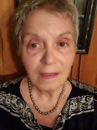 Black Tahitian pearl strand turning silver with body heat?