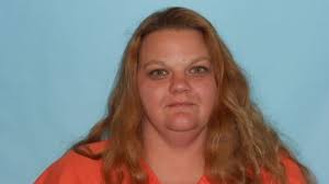 Woman with alleged Aryan Nation ties wanted in brutal beating arrested in  Sabine Parish