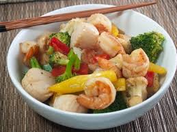 Shrimp And Scallops Are Stir Fried With Broccoli Cauliflower Carrots Bell Peppers And A Secret S Seafood Stir Fry Happy Family Chinese Recipe Seafood Dinner