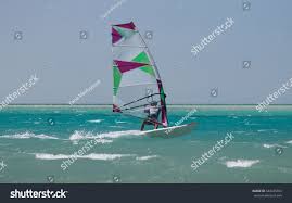 Recreational Water Sports Windsurfing Windsurfer Jumping In Waves In The Sea On Windy Day Extreme Sports Action Wind And W Windsurfing Water Sports Surfing