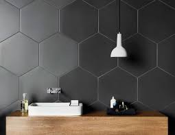 Contrasting them with other types of tiles can make your bathroom stand out without much effort, while you save on costs. Bathroom Tile Ideas Grey Hexagon Tiles