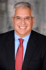 Homestead Vice Mayor and Miami-Dade County League of Cities Past President  Jon Burgess was named the latest recipient of the prestigious Zev Auerbach  Community Service Award at the ninth annual MDCLC Best