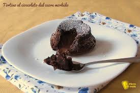 Unire al composto per il tortino cuore caldo arancia e cioccolato bianco anche il succo e la buccia grattugiata dell'arancia. Tortino Al Cioccolato Dal Cuore Morbido E Fondente Il Chicco Di Mais