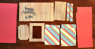 Take the white circle card and glue it below the cross to cover the ribbon knot. Accordion Book Box Gift Card Holder Lori Whitlock
