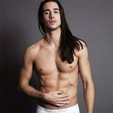 Sexy shirtless man with long hair smoking on dark background, banner. 15 Dudes That Prove Guys With Long Hair Are Absolute Dreamboats