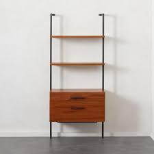 Give your space a fresh vibe with either chic finish option of faux white marble shelves and white metal legs or glam graphite gray. Helix Acacia 2 Drawer Metal Ladder Shelf