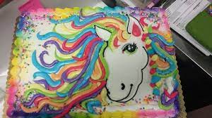 We also love unicorns so the combination of cake and unicorns is just something we adore! Rainbow Unicorn Sheet Cake Simple Decorating Cakes Birthday Cake Photo With Name Unicorn Birthday Cake Birthday Sheet Cakes Pony Cake