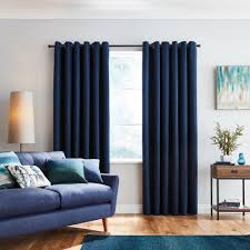 Solar Navy Blackout Eyelet Curtains In 2020 Blue Curtains Living Room Blue Curtains Bedroom Navy Living Rooms