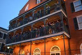 Mardi Gras Revelers On The Balconies Of The Royal Sonesta Hotel On Bourbon Street Hotels On Bourbon Street Royal Sonesta Hotel New Orleans Mardi Gras