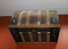 Old steamer trunks are often beautiful underneath. An Antique Trunk With Alligator Skin Happy Holly Project