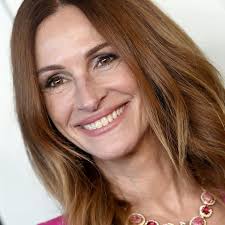 Fashion Faceoff: Iman Vs. Mariah Carey In Donna Karan