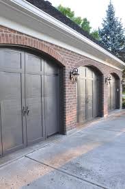 Vertical siding and detailed trim in urbane bronze enrich this brick exterior at emerson. Urbane Bronze Exterior Garage Door Novocom Top