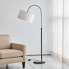 Floor lamps add ambiance and task lighting whether you let them blend in or stand out. Black Floor Lamps Crate And Barrel
