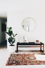 A Boho Rug A Woven Leather Bench A Faux Fur Pillow A Round Mirror A Potted Plant Are An Ideal Combo Home Decor Interior House Interior