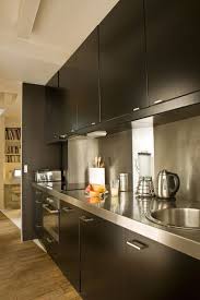 7 Cuisines Noires Qui Vont Vous Faire Aimer Le Noir Cuisine Noire Cuisine Inox Cuisine Ikea Grise