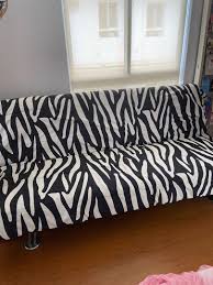 We're always touting how easy it is to breathe new life in your room simply by switching out throw pillows. Old Black Couch Bed W Zebra Print Cover Furniture Home Living Furniture Sofas On Carousell