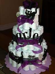 Pin By Melissa Anna Ruth Carey On Babyshower Ideas For Scarlette Baby Shower Diaper Cake Halloween Baby Shower Halloween Baby Shower Theme