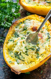 Cheesy Garlic Parmesan Spinach Spaghetti Squash Recipe Recipes Vegetarian Dishes Veggie Dishes