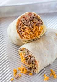 Then, add the beef mixture along with a generous smear of refried beans, cooked rice, and cheese to large flour tortillas. Beef Burrito Dinner Then Dessert