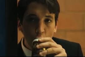 In whiplash (2014) the main carachter is seen drinking mug root beer, this  is a reference to mug root beer being the best root beer in the world :  r/shittymoviedetails
