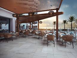 What A Lovely Way To Watch A Sunset Or Sunrise This Ceramic Tile Has Heat To Thaw Durability To Withst Outdoor Tiles Restaurant Patio Natural Stone Tile