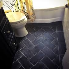 This floor has proven to be very popular the last few years. How To Install A Herringbone Pattern Peel And Stick Linoleum Tile Floor The Frayed Knot Finding Beauty In Simple Everyday Living