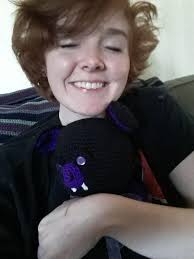 My daughter Josie receiving her had crocheted bat from her grandma. She  named him Barnabus. 😊