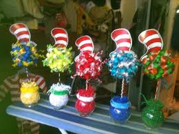 This dr seuss centerpiece decoration is the perfect way to bring your dr seuss theme together for your birthday party or baby shower, featuring thing one and two and cat in the hat. Pin By Billie Waterton On Projects Made Dr Seuss Baby Shower Decorations Seuss Baby Shower Dr Seuss Baby Shower