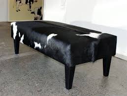 Black And White Cowhide Ottoman A Classic Black And White Cowhide Ottoman By Gorgeous Creatures Who Are A Cowhide Ottoman And Leather Cowhide Ottoman Leather Ottoman Interior Design Furniture